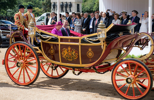Her Majesty Queen Elizabeth II and His Majesty the King of Spain riding in a carriage on the Spanish state visit