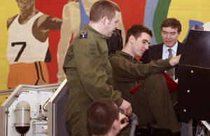 Philip Dunne with trainee technicians in RAF Cosford's training hangar [Picture: Crown Copyright/MOD 2013]