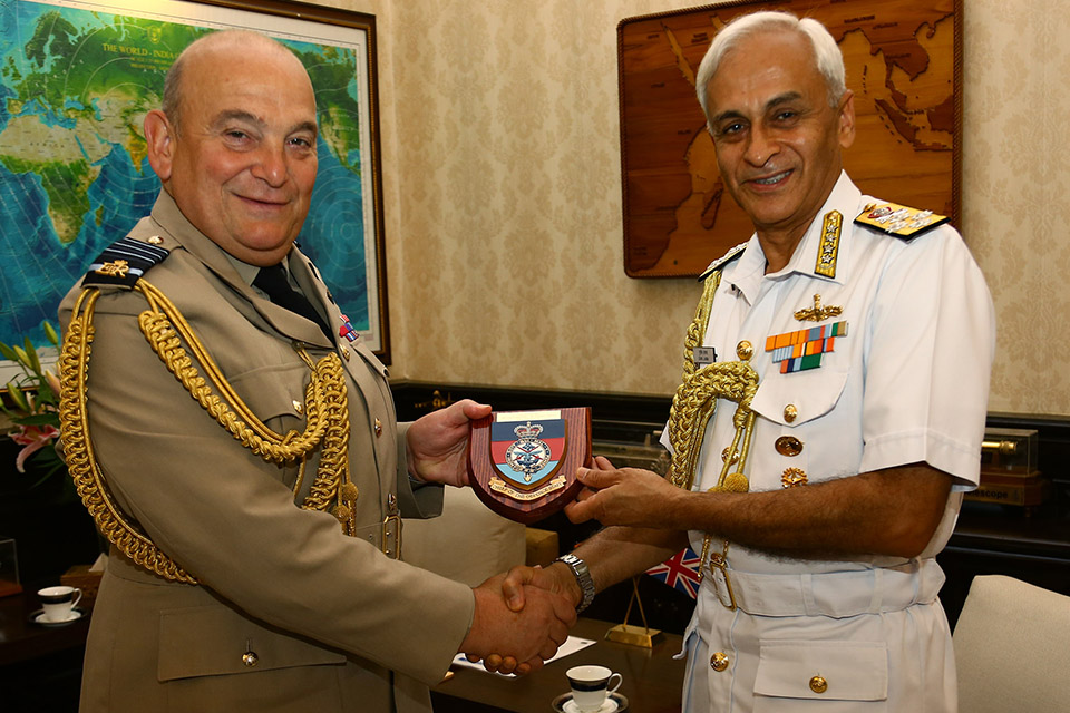 Chief of Defence Staff Sir Stuart Peach presents a memento to Admiral Sunil Lanba PVSM AVSM ADC, Chairman of the Chiefs of Staff Committee (COSC). Copyright British High Commission India.