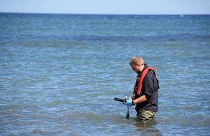 EA officer taking bathing water samples