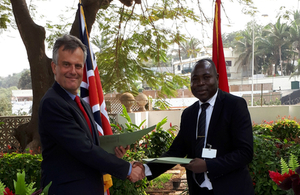 Ambassador John Dennis with Pascoal Baptistiny Head of Mbakita (Cubango's beneficiary mission for inclusion, technology and environment)