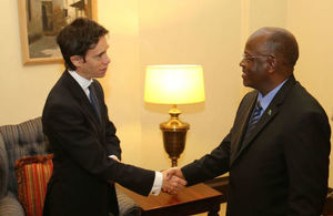President Magufuli shaking hands with Min. Rory Stewart