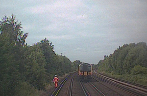 Forward facing CCTV image showing track worker in front of train (courtesy of South Western Railway).