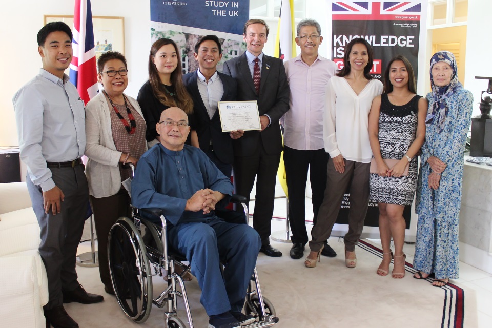 British High Commissioner Richard Lindsay with Shahyzul and his family