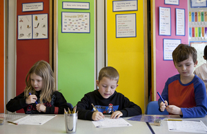 Children writing in class
