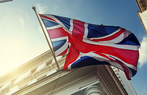 Union Jack Flag flies over a UK government building