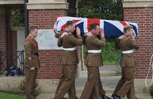 Royal Anglian Regiment bring a coffin into the cemetery - Crown Copyright, All Rights Reserved