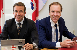 Scott Brison, President of Canada’s Treasury Board and Minister for Digital Matt Hancock digitally sign the memorandum