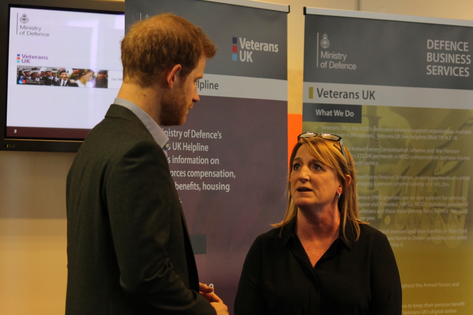 Christine Bulpitt explains the support provided by the Veterans UK Helpline team to Prince Harry, Crown Copyright, All Rights Reserved