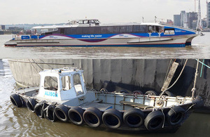 High-speed catamaran Typhoon Clipper and workboat Alison