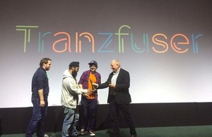 One of the winning teams, "Shuttershade Studios", receiving their award.