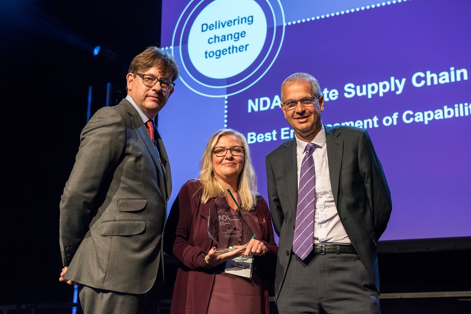 Jacqueline Longrigg from the University of Cumbria receives the skills award from Ron Gorham (left), NDA Head of Supply Chain,  and NDA HR Director David Vineall