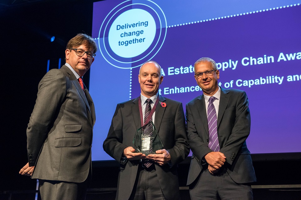 Jonathan Matthews (centre), of Rolls-Royce, collects the winner's skills award