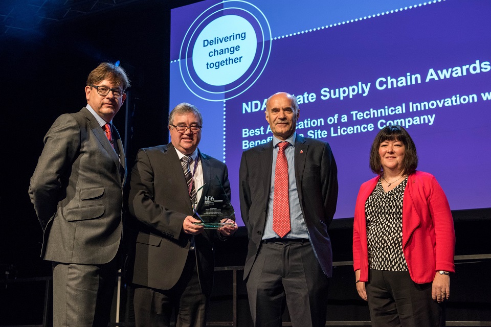 Nuvia's Phil Nelson (second left) collects the innovation award from Ron Gorham, Derek Allen from Innovate UK and NDA Head of Technology Melanie Brownridge