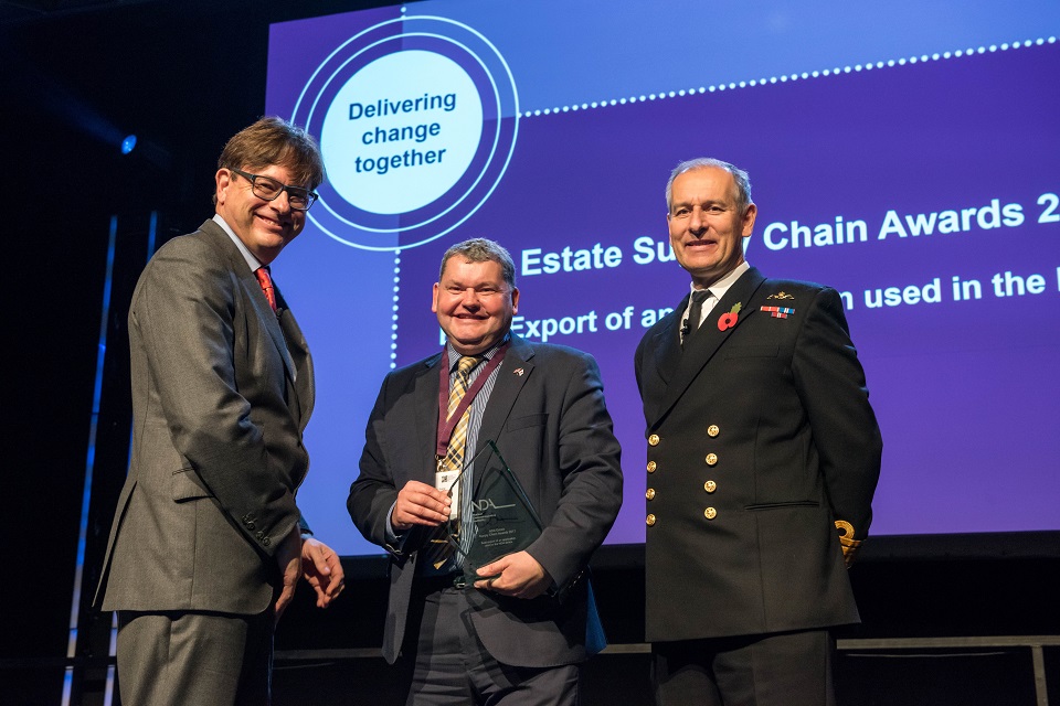 Mark Sharpe of Oxford Technologies, who won the export award, with Ron Gorham and Rear Admiral Keith Beckett