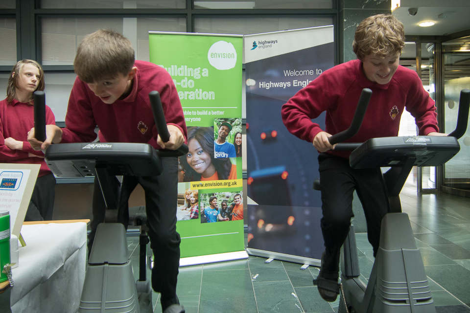 Image of two students on cycling machine