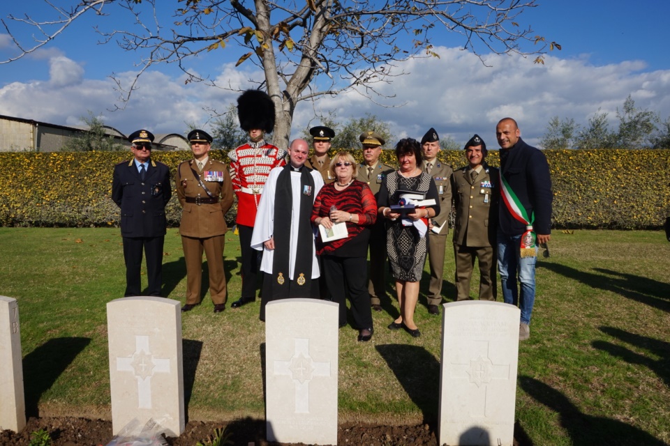 The Goulden family accompanied by Reverend Jacob Caldwell, members of the Coldstream Guards, British Exchange Officer Colonel David Rook and Italian officials. Crown Copyright, All rights reserved