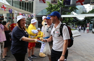 British Consular Officer Laura Morgan with Barmy Army supporters in Brisbane