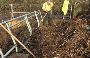 Image shows the team clearing debris at spring gardens