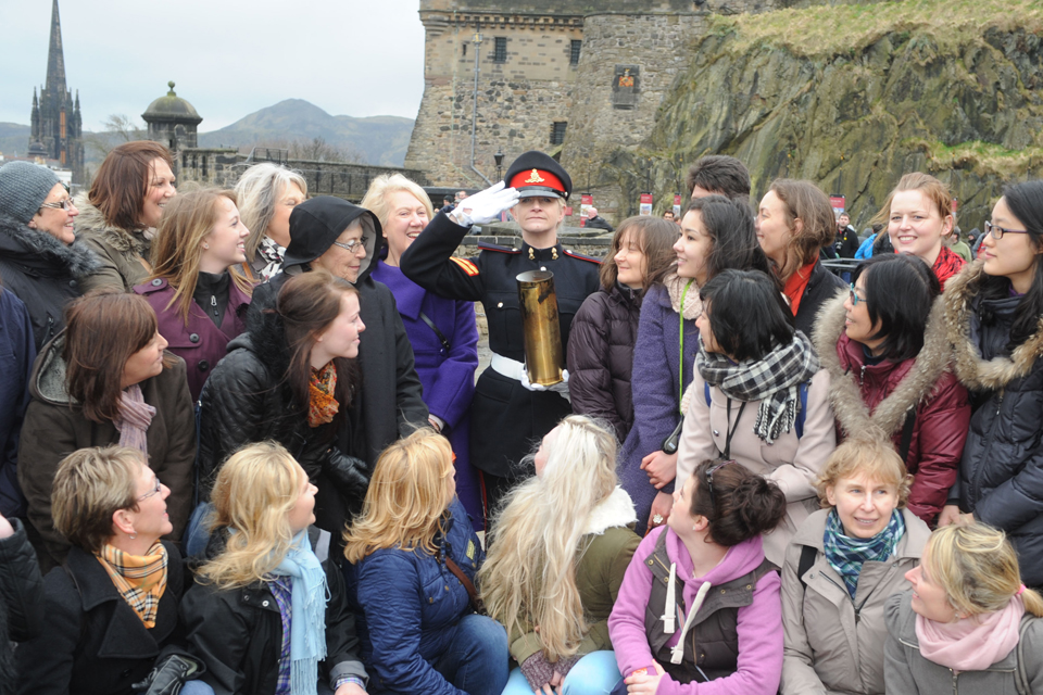 Bombardier Allison Jones with women visitors from all over the world