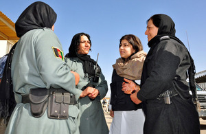 Foreign Office Senior Minister of State, Baroness Warsi with police women at Helmand Provincial Police Headquarters