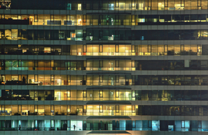 Multi-storey building lit up at night