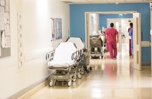 Doctors walking down hospital corridor