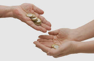 Hands exchanging coins