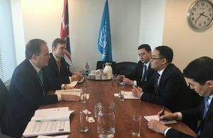 Minister Mark Field and Afghanistan Deputy Foreign Minister Hekmat Khalil Karzai discuss climate change.