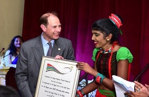 The Earl of Wessex with a communication impaired student following The Duke of Edinburgh's international award scheme.