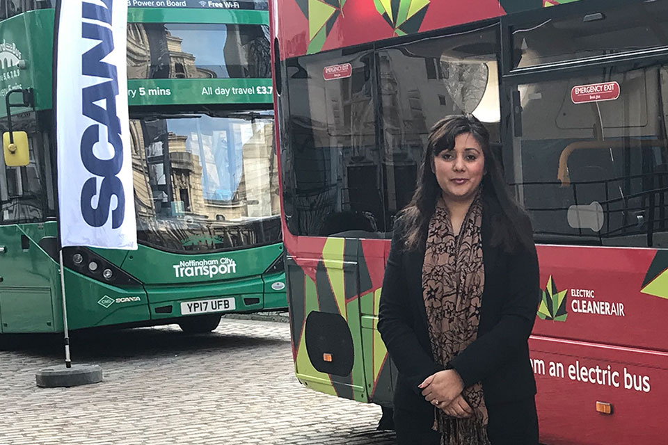 Picture of Nusrat Ghani in front of the electric buses.