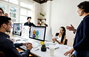 Team work together on computers by Rawpixel.com at Shutterstock