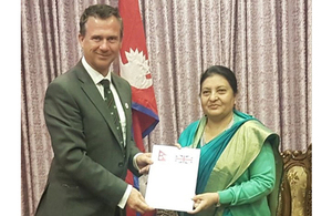 Defence Minister Mark Lancaster presents the Right Honourable Bidya Devi Bhandari with the Gurkha Annual Report. Crown copyright.