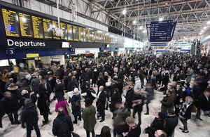 Busy London railway station at peak time