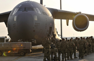 British troops are pictured boarding an RAF C-17 flight at 901 EAW (Expeditionary Air Wing) B Flt before the transit to Camp Bastion, Afghanistan. Crown copyright.