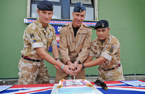 Members of the Queen's Gurkha Signals from 22 Signal Regiment cut their birthday cake [Picture: Corporal Pete Devine, Crown Copyright/MOD 2011]