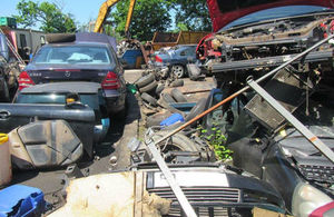 Photo of various cars partly dismantled all heaped together