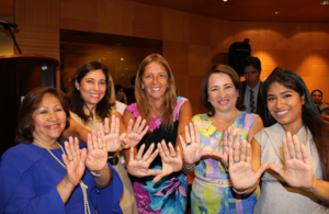 Ambassador for a Day, Raquel Monge (right), 'presses for progress' with four Peruvian ministers at the Lima Stock Exchange.