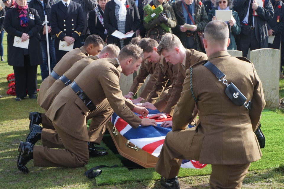 Riflemen from the 3rd Battalion, the Rifles, carefully fold the ceremonial Union Flag in honour of Private Edmundson, Crown Copyright, All rights reserved