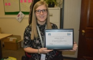 Beth McKee accepting the award for the Nuclear Institute Young Generation Network Excellence Prize