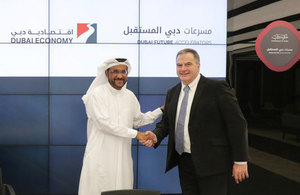 ObjectTech chief executive, Paul Ferris (right), signs an agreement with Ali Ibrahim, Deputy Director General of Dubai Economy.