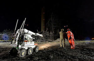 The pictures shows the Explosive Ordnance Disposal Equipment hard at work.