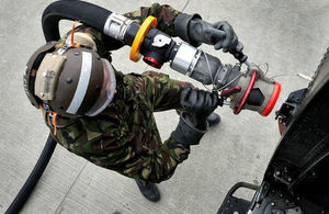 The pictures shows a soldier operating the vehicle-borne aircraft refuelling capability (FARS).