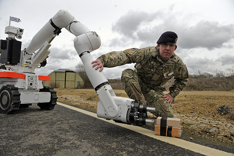 Soldier with a Cutlass bomb disposal robot