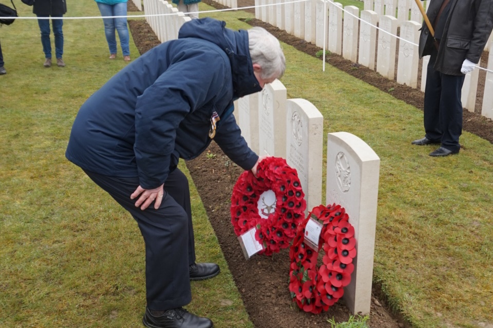 Ken MacDonald lays a wreath at Serjeant MacKenzie’s grave on behalf of the family. Crown Copyright, All rights reserved