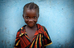 A young girl stands by a wall. Picture: Comic Relief