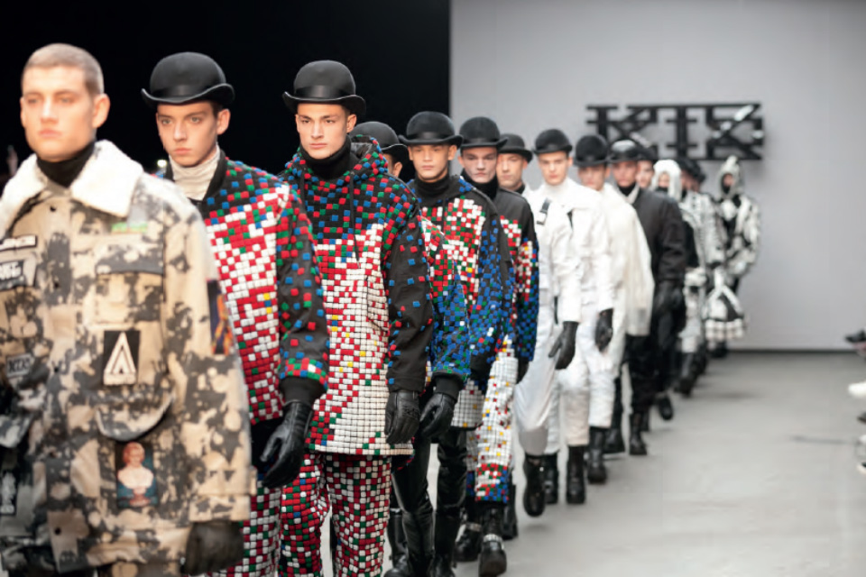 Male models on a catwalk.