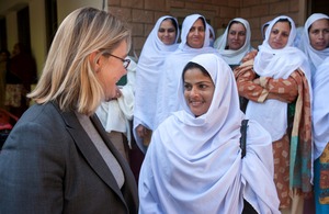 Justine Greening meets lady health workers during a visit to a health clinic in Islamabad. Picture: Usman Ghani/ DFID