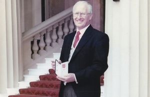 Frank Blewett with his OBE in 1998