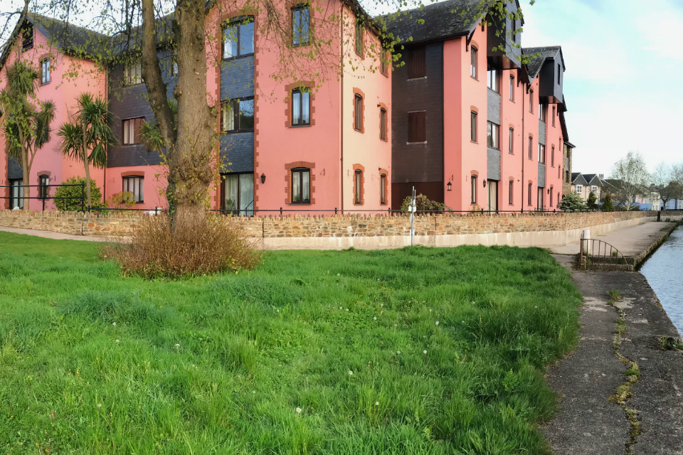 Throgmorton House on the bank of the River Dart in Totnes, where new flood walls have been built